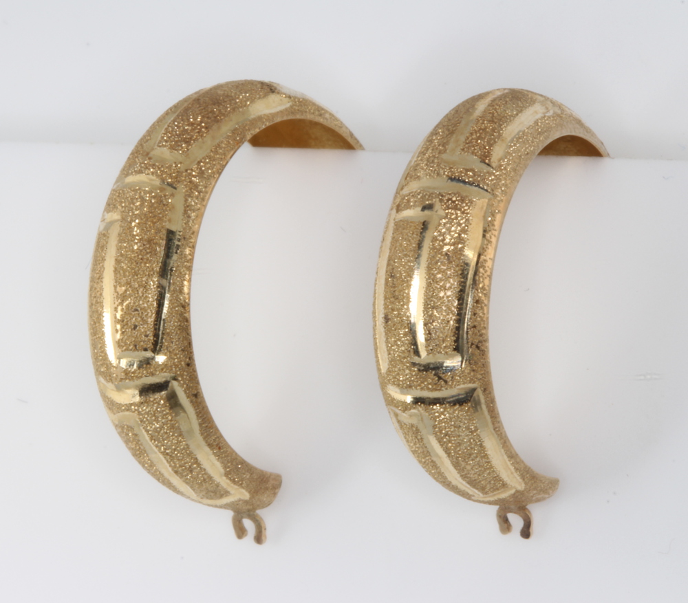 A pair of 14ct yellow gold hoop earrings 2.2 grams