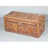 A Chinese twin handled carved hardwood coffer with hinged lid, 43cm h x 98cm w x 44cm d