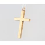 A 9ct yellow gold cross pendant 2.5 grams