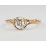 A yellow gold 3 stone diamond crossover ring, size O