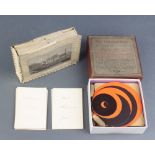 The Brahmins Rings dexterity game boxed, together with a set of charade/parlour game cards
