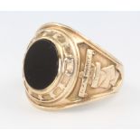 A 9ct yellow gold onyx set fraternity ring 14.1 grams, size Q 1/2