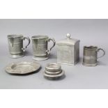 A pair of Victorian pewter spouted measures marked W R Loftus 146 Oxford Street, London, bases