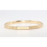 A 9ct yellow gold bangle, 12.1 grams