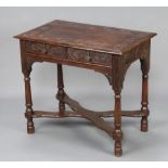 Edward and Roberts, a Victorian carved oak side table fitted 2 drawers, raised on turned supports