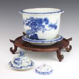 A Chinese circular blue and white porcelain jardiniere with scallop rim, the body decorated birds