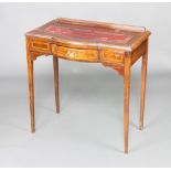 An Edwardian inlaid mahogany bow front writing top with raised top, inlaid leather writing