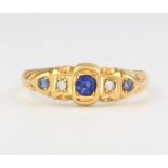 An 18ct yellow gold sapphire and diamond ring, size O 1/2, 2.3 grams