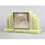An Art Deco mantel timepiece with square silvered dial marked Armstrong Manchester, contained in a