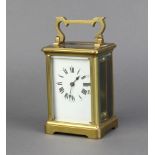A 19th Century French 8 day carriage timepiece with enamelled dial, Roman numerals, contained in a