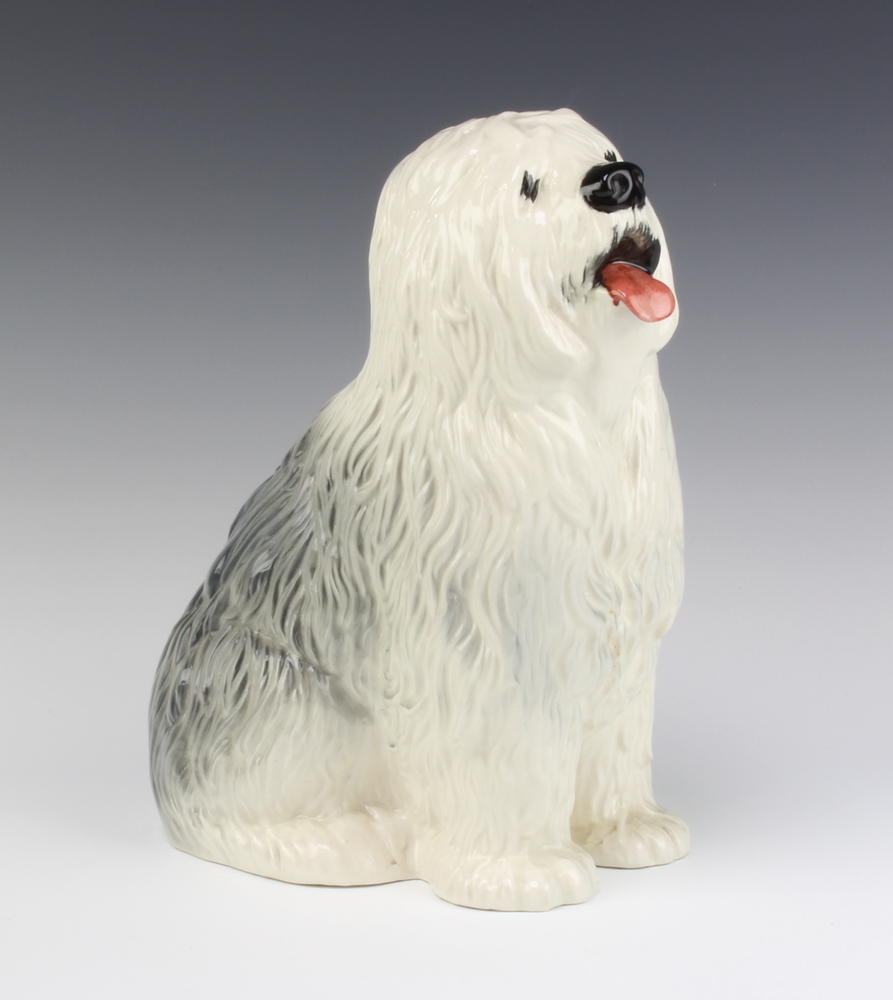 A Beswick figure of a seated Old English sheep dog, base marked Beswick 30, 28cm h