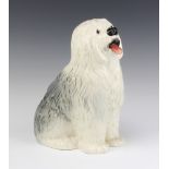 A Beswick figure of a seated Old English sheep dog, base marked Beswick 30, 28cm h