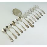 A 13 piece Continental silver fruit service comprising serving spoon and 12 spoons, 242 grams