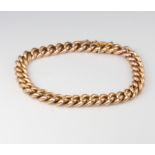 A 9ct yellow gold curb link bracelet 16.6 grams