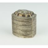 A 19th Century Continental engine turned rounded rectangular silver box with repousse decoration