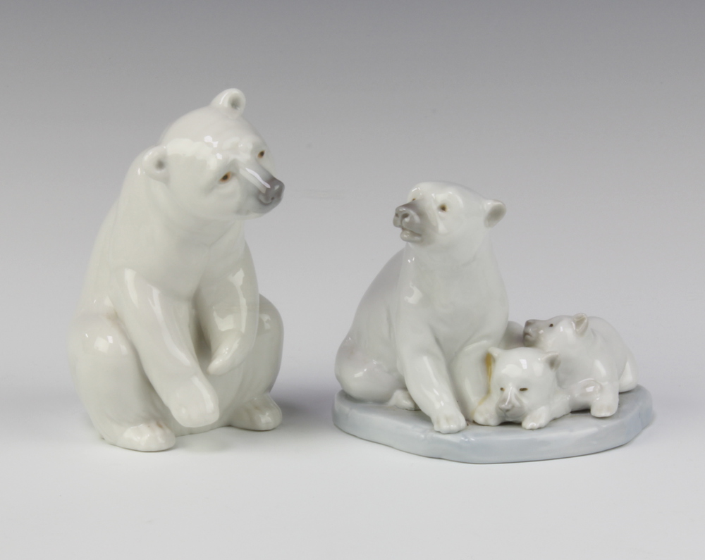 A Lladro figure group of a seated polar bear and cubs, base impressed A-9N 9cm (crack to base) and 1