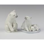 A Lladro figure group of a seated polar bear and cubs, base impressed A-9N 9cm (crack to base) and 1