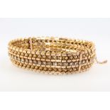 An 18ct yellow gold pearl set bracelet 41.2 grams