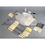 An oval silver plated tray and minor plated cutlery and condiments