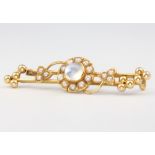 A 15ct yellow gold moonstone and seed pearl bar brooch, 3.5 gramsThe pin is missing