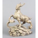 A Chinese gilt metal figure of a ram 25cm x 12cm x 9cm