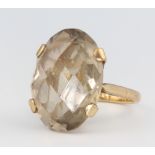 A 9ct yellow gold smoky quartz dress ring size L