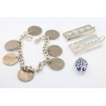 A silver bracelet and minor silver jewellery, 100 grams