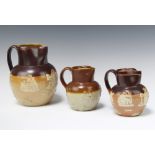 A Royal Doulton salt glazed Harvest Ware jug 5088 20cm, 1 other impressed KX2892 13cm and an