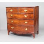 A Georgian inlaid mahogany and crossbanded bow front chest of 2 short and 3 long drawers, raised