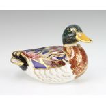 A Royal Crown Derby paperweight in the form of a duck, base marked MMV and with gold stopper 5cm