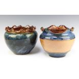 A circular blue and brown glazed Royal Doulton jardiniere with wavy border, base impressed 7884 18cm