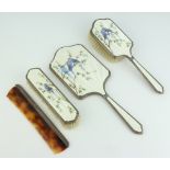 A silver and enamelled 3 piece dressing table set comprising hair brush, hand mirror and clothes