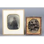 Early black and white photograph of a seated family group 7cm x 6cm contained in a gilt and