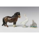 A Beswick figure of a Shetland pony 14cm, Lladro figure of a goose 11cm and a Chelsea style figure
