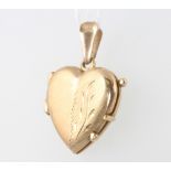 A 9ct yellow gold heart locket 5 grams