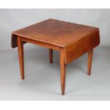 An Edwardian mahogany drop flap dining table raised on square tapered supports 71cm h x 84cm w x