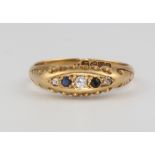 An 18ct yellow gold sapphire and diamond ring, size N, 3 grams