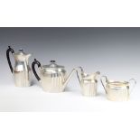 A silver 4 piece tea and coffee set with ebony mounts, London 1918, gross 1560 grams