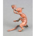 An Austrian cold painted bronze figure in the form of a seated Devil 5cm x 4cm Some paint loss
