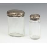A Victorian cylindrical panel cut pin jar with planished silver lid 8cm x 3 cm Birmingham 1897 (