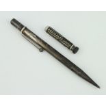 A silver cased propelling pencil London 1947