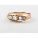 A 9ct yellow gold pearl ring, size L, 3.6 grams