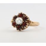 A 9ct yellow gold pearl and garnet ring size L, 2.8 grams