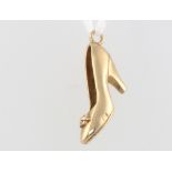 A 9ct yellow gold shoe charm 1.9 grams