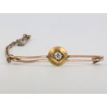 A 9ct yellow gold diamond bar brooch 2.1 grams