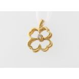 An 18ct yellow gold 4 leaf clover diamond pendant 1.9 grams