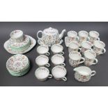 A 37 piece Minton Haddon Hall tea service comprising teapot, cream jug (second) sugar bowl (second),