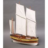 A model of a 3 masted sailing ship 64cm x 46cm x 15cm