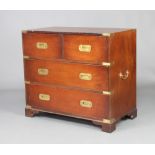 A 20th Century mahogany and brass mounted military chest of 2 short and 2 long drawers with brass
