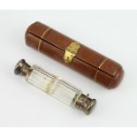 A Victorian silver plated mounted double ended scent bottle contained in a fitted leather case